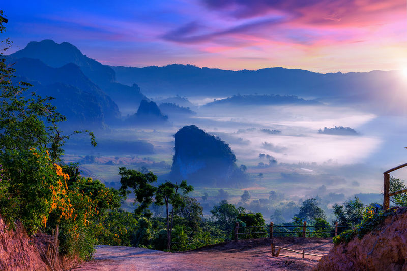 Sunrise and  mist at pha chang noi viewpoint, phu langka national park, phayao province, thailand