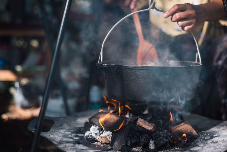 Midsection of chef preparing food