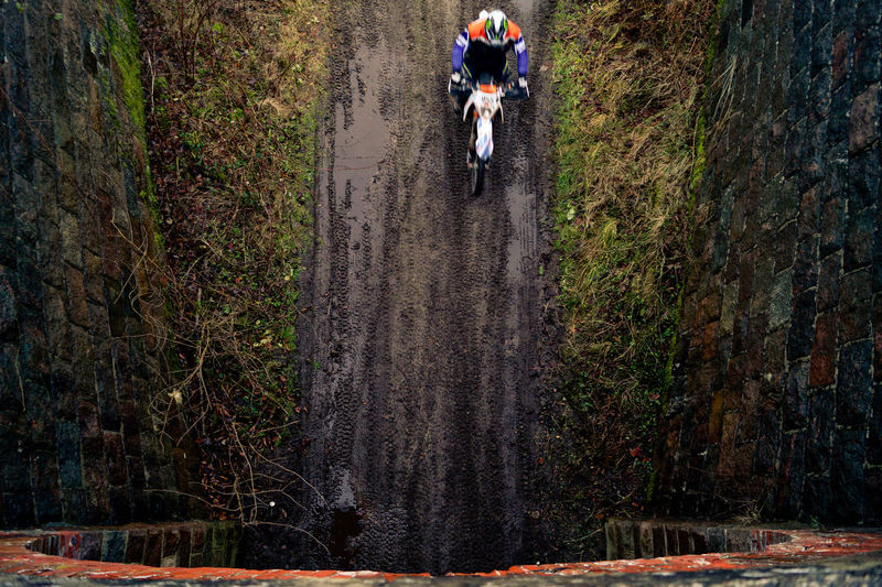 High angle view of motocross rider from bridge