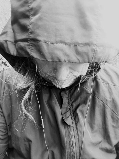 Close-up portrait of man covering face
