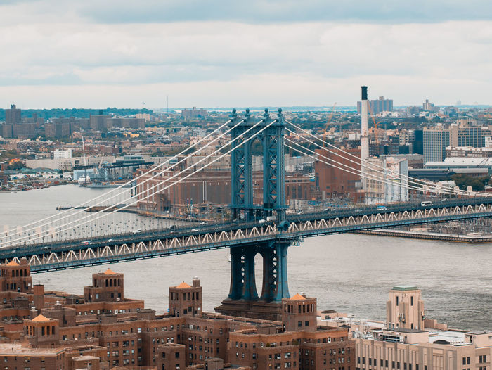 High angle view of suspension bridge in city