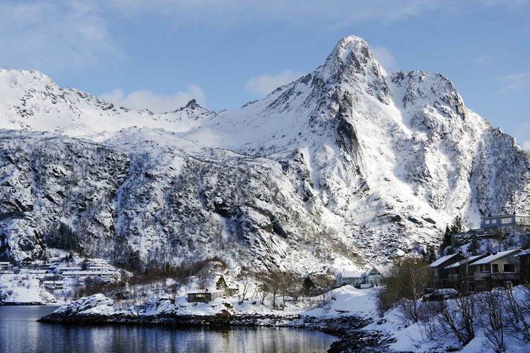 Scenic view of snowcapped mountains against sky