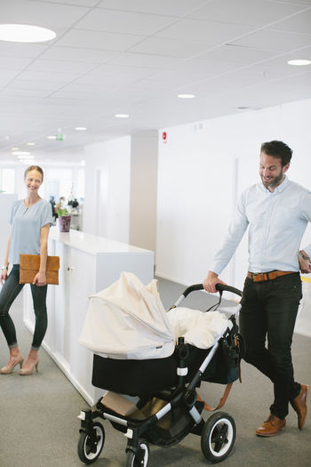 Man with buggy in office