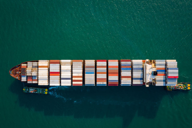 Aerial top view from drone, container ship or cargo shipping business logistic import and export 