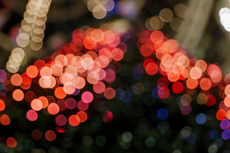 Defocused image of illuminated lights at night