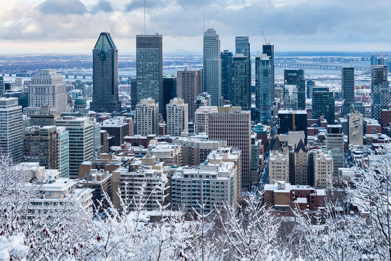 View of buildings in city during winter