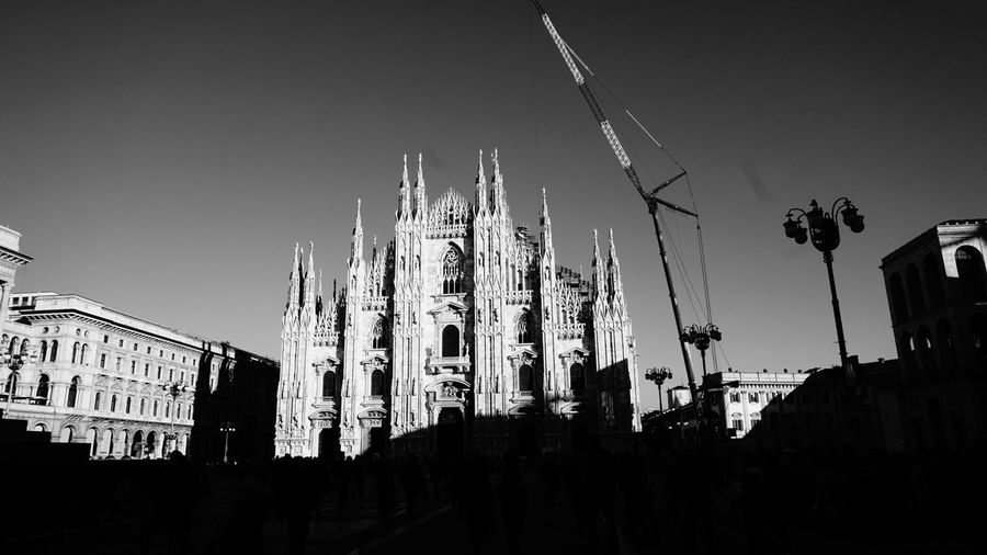 Low angle view of duomo di milano against clear sky