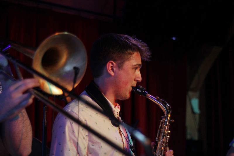 Man playing trumpet at music concert