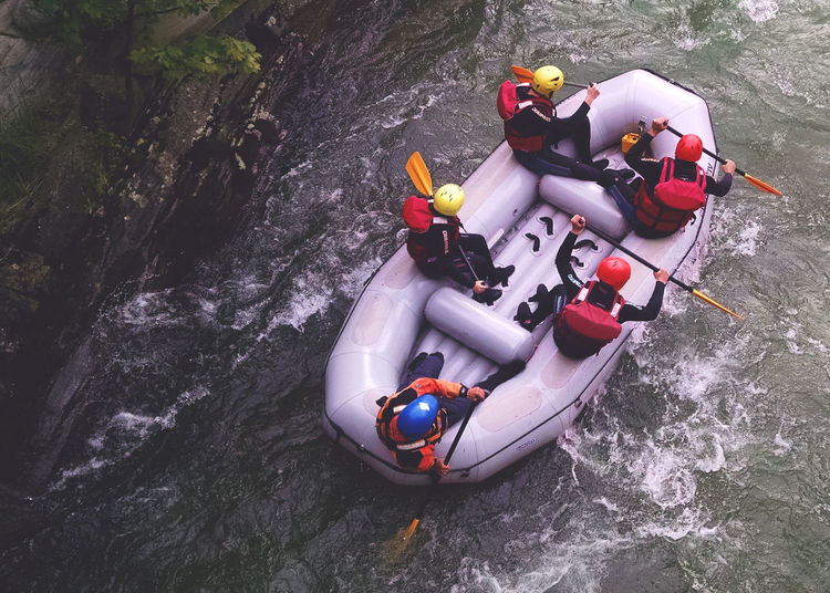 High angle view of people rafting on river