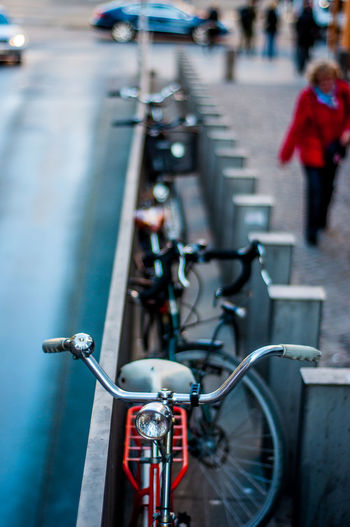 Close-up of bicycle parked in city