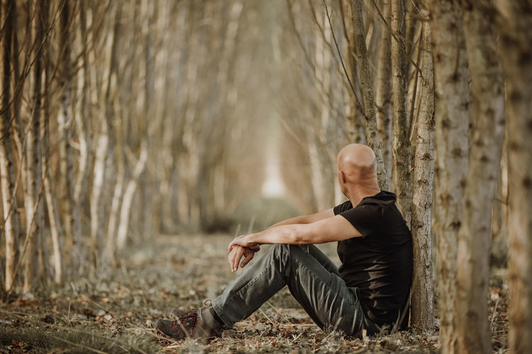Man sitting in a forest