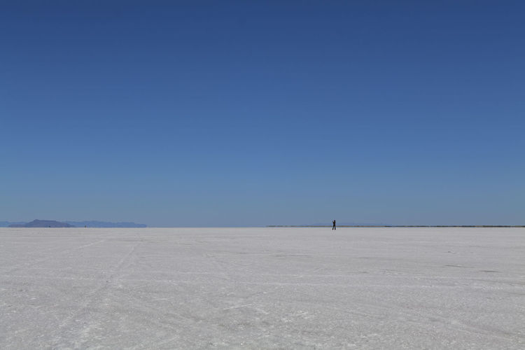 Salt flats in utah. salt flats landscape. blue sky and snow-white salt soil. bonneville salt flats