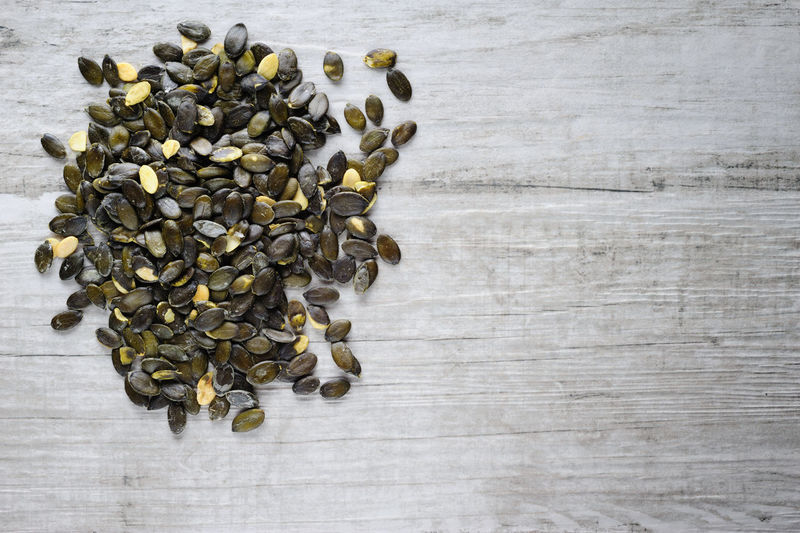 Close-up of pumpkin seeds on table