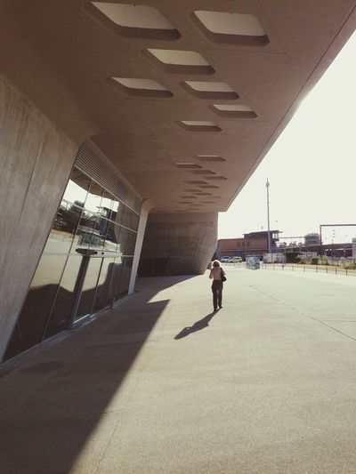 Full length of woman standing in city