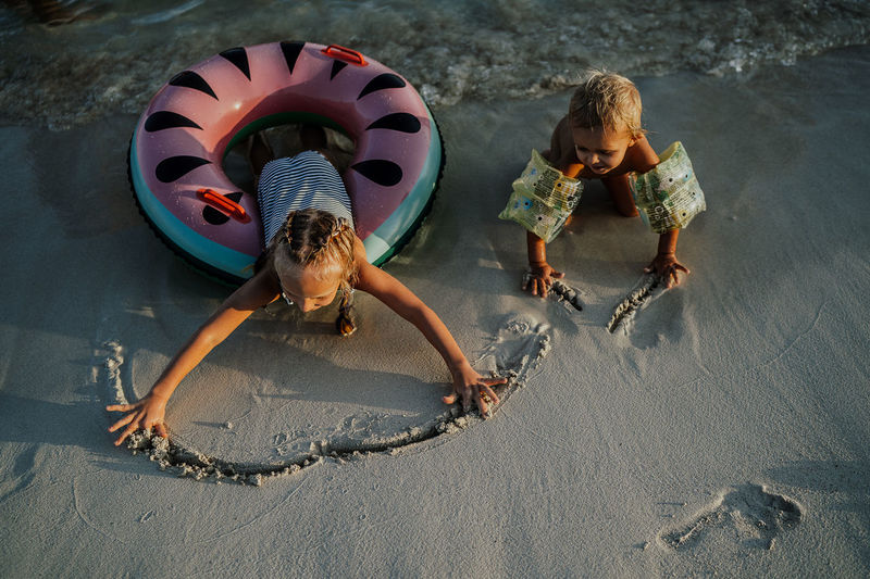 High angle view of children on beach
