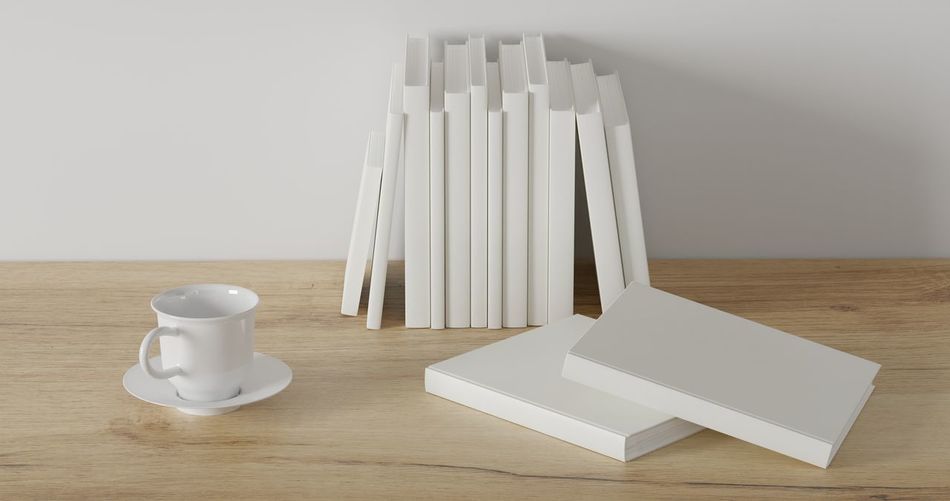 Close-up of coffee cups on table
