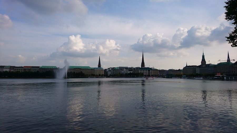 Panoramic view of river against sky in city