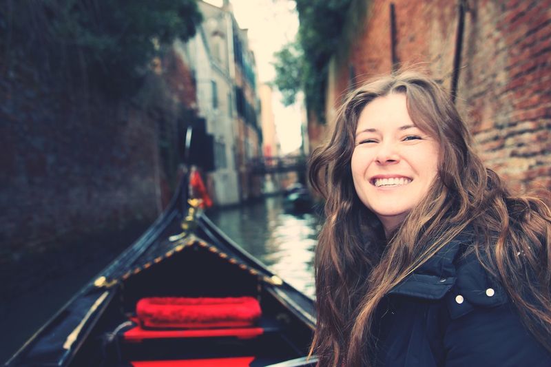 Portrait of young woman in boat