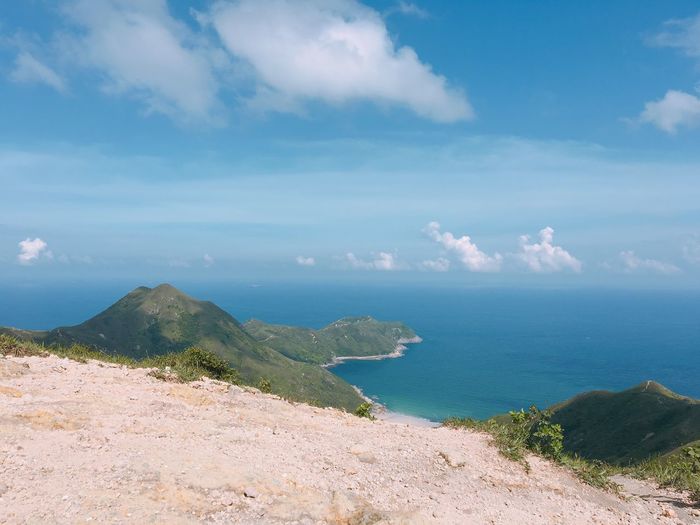 Scenic view of sea against blue sky