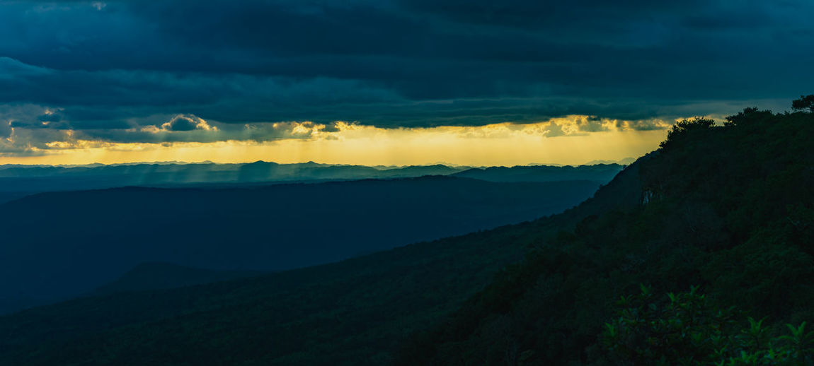 Panoramic landscape of mountain ridges with sunset sky and cloud at  a national park of thailand.
