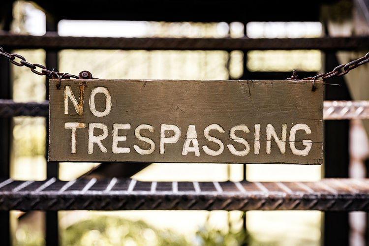 Close-up of no trespassing sign