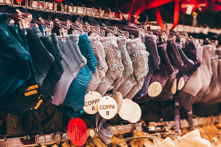 Clothes hanging in store for sale at market stall