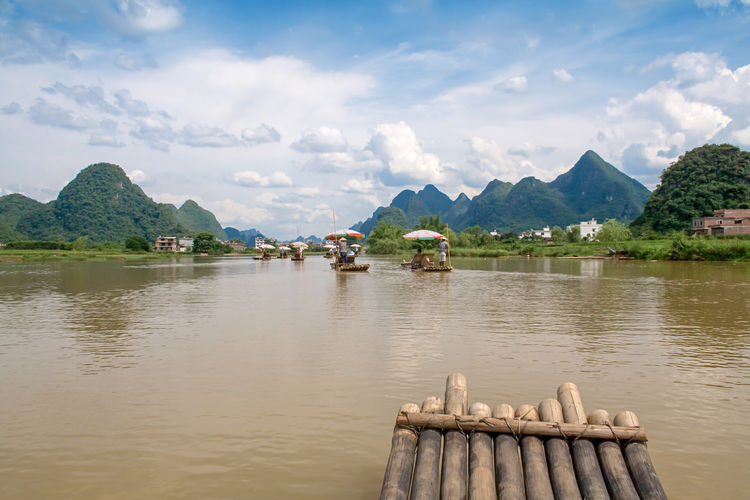 Traditional bamboo raft on yulong river, yangshuo, guangxi, china. 