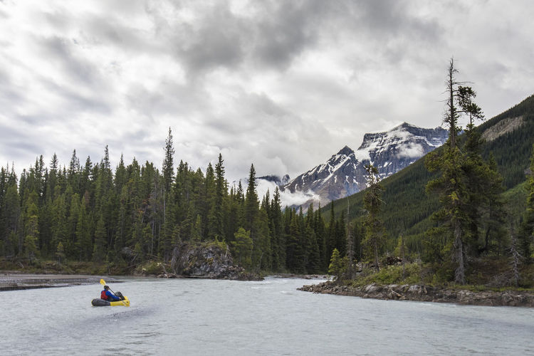 Packrafting in the rocky mountains, banff national park.