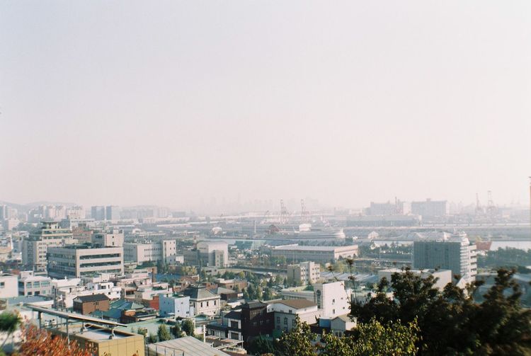 High angle view of cityscape against clear sky