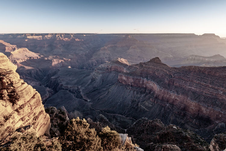 Retro style picture of sunrise at grand canyon mather point, arizona on a sunny morning in fall