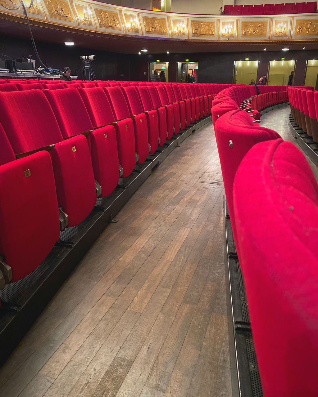 seat, red, auditorium, chair, arts culture and entertainment, sport venue, in a row, stage theater, no people, indoors, empty, movie theater, sports, absence, architecture