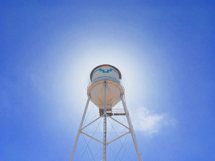 Low angle view of water tower against sky