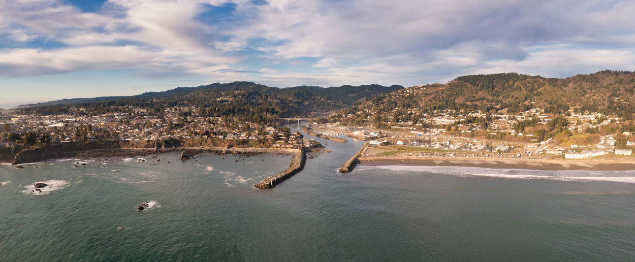 Brookings, oregon, usa. panorama of harbor entrance and mouth of chetco river.