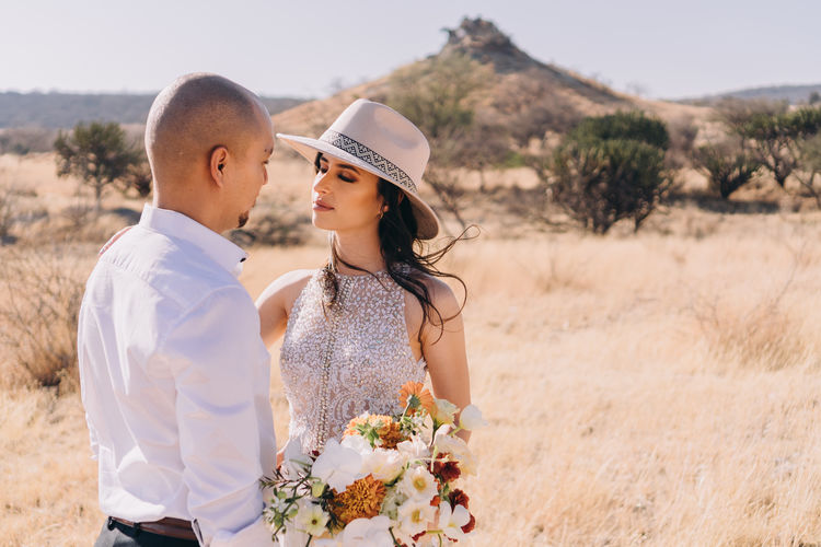 Young couple standing on land