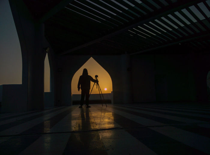 Silhouette man inside the mosques