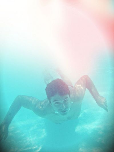 Man swimming in sea