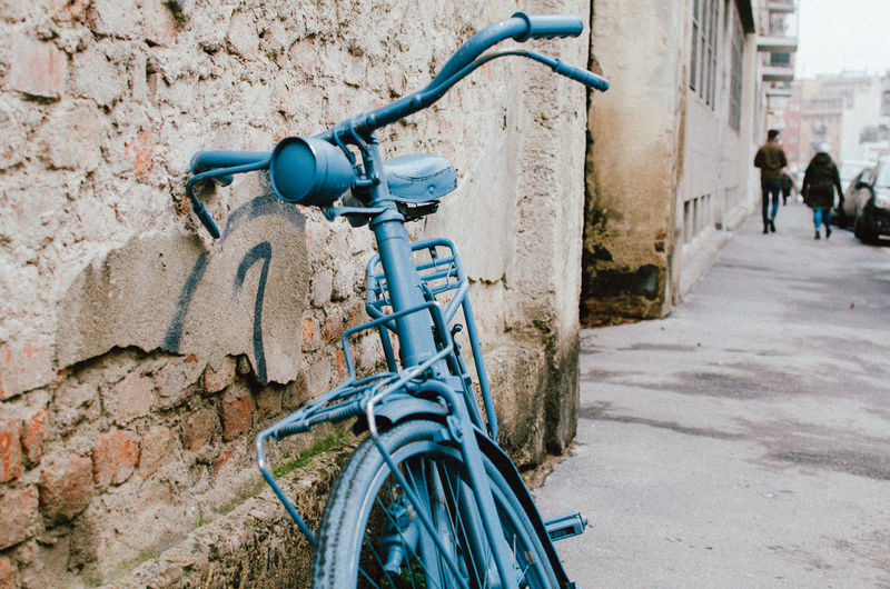 Close-up of bicycle in city