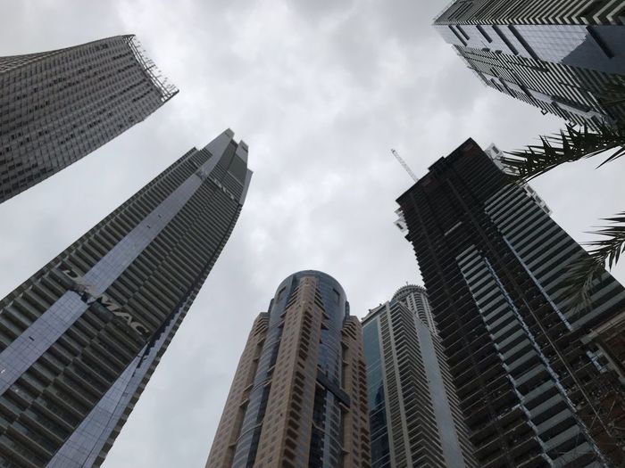 Low angle view of modern buildings against sky