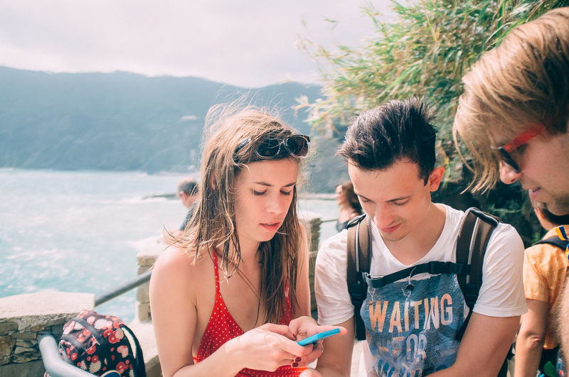 Young couple looking at smart phone