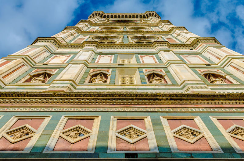 Low angle view of giottos bell tower against sky