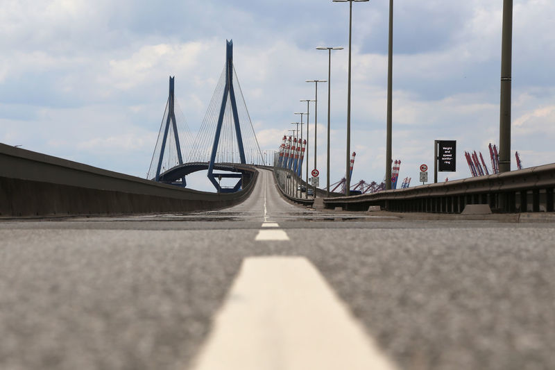 Bridge against sky in city