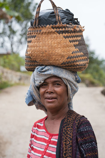 Portrait of smiling woman wearing hat