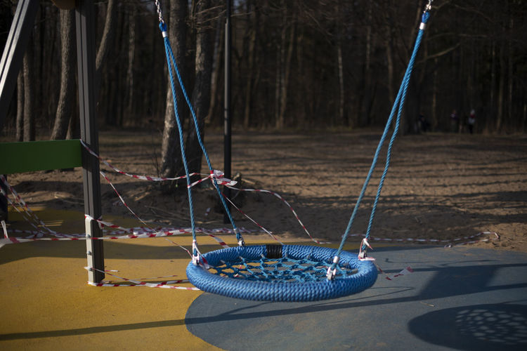 Close-up of swing in playground