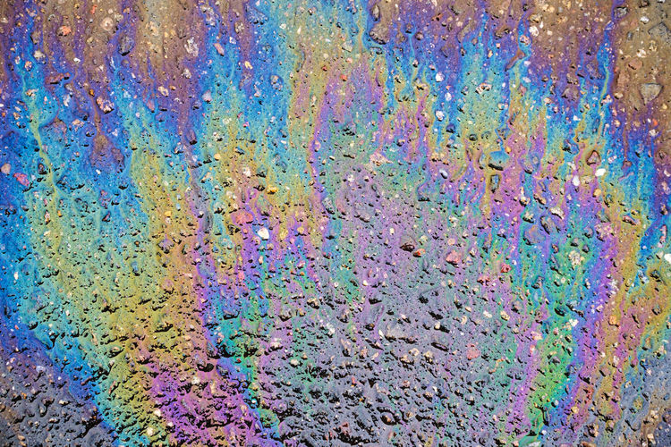 Full frame shot of multi colored water on wall