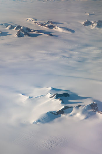 Scenic view of frozen lake against sky