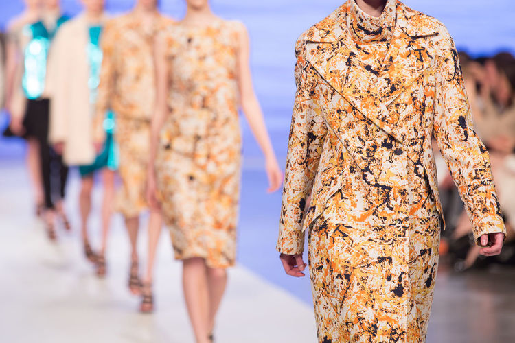 Fashion models walking on catwalk