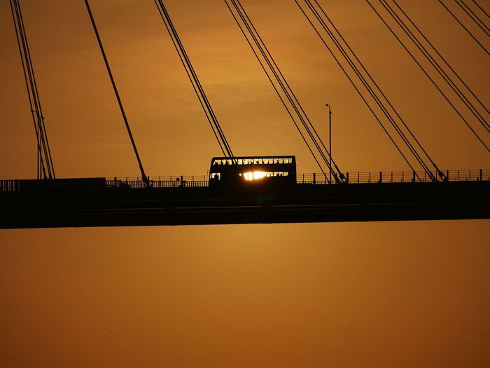 Bridge against sky during sunset