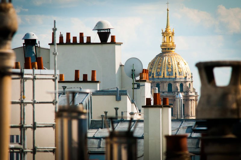 Cathedral by buildings in city
