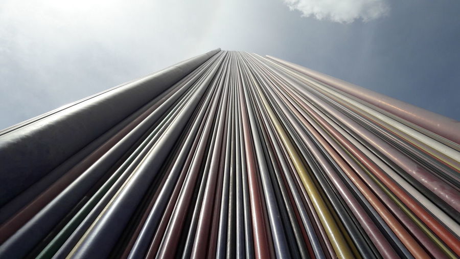 Low angle view of striped tower monument at la defense