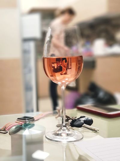 Close-up of wine glass on table